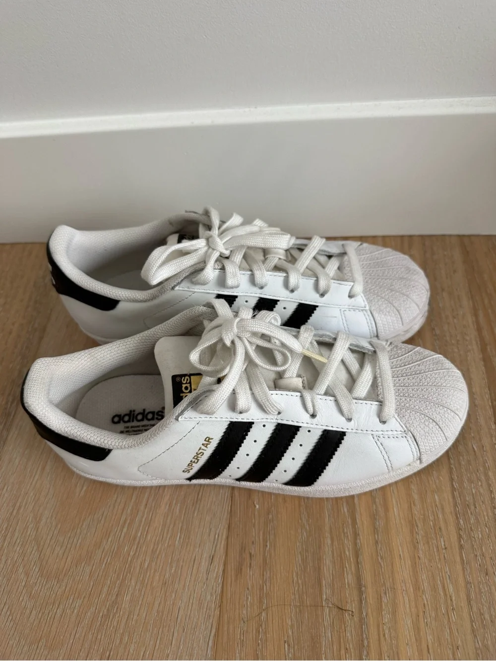 adidas Superstar Sneakers in White and Black
